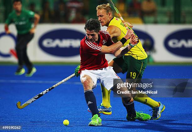 Timothy Deavin of Australia vies with Harry Martin of Great Britain during the match between Australia and Great Britain on day three of The Hero...
