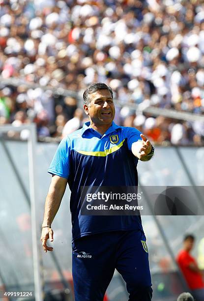 Ronald Fuentes head coach of U de Concepcion gives intructions to his players during a match between Colo Colo and U de Concepcion as part of 14th...