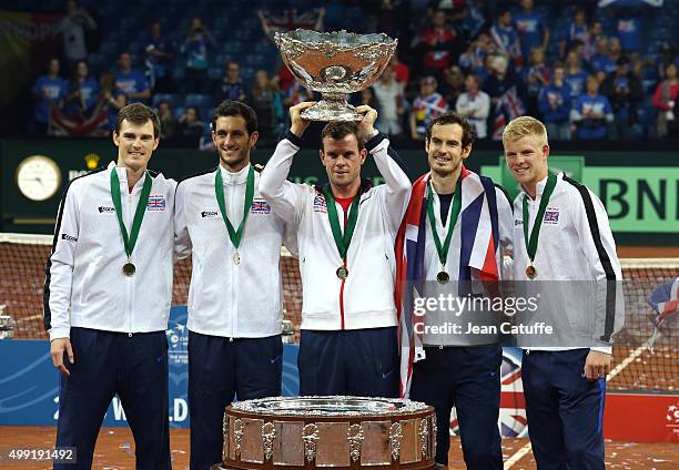 Captain Leon Smith of Great Britain lifts the trophy following his team's victory on day three of the Davis Cup Final 2015 between Belgium and Great...