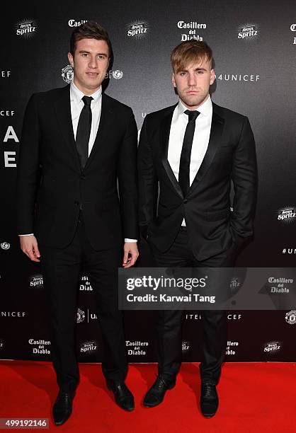 Paddy McNair and Luke Shaw attend the United for UNICEF Gala Dinner at Old Trafford on November 29, 2015 in Manchester, England.