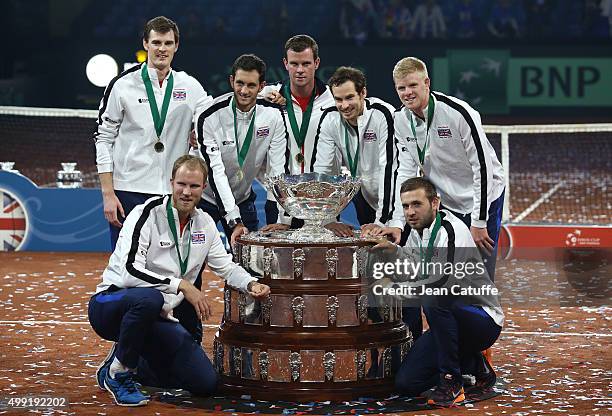 Andy Murray, Jamie Murray, Kyle Edmund, James Ward, Dan Evans, Dominic Inglot and Captain Leon Smith of Great Britain pose with Davis Cup following...
