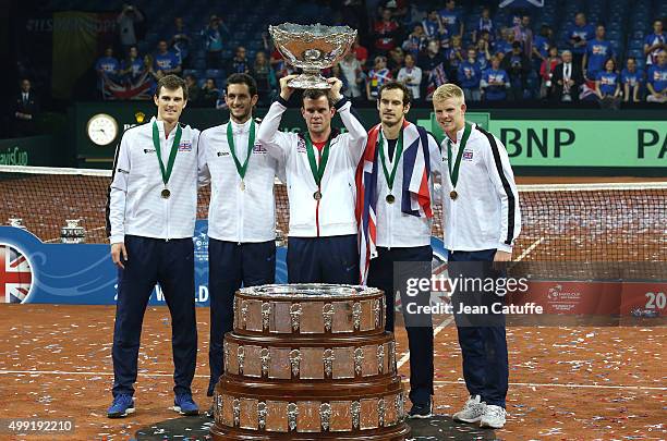 Captain Leon Smith of Great Britain lifts the trophy following his team's victory on day three of the Davis Cup Final 2015 between Belgium and Great...