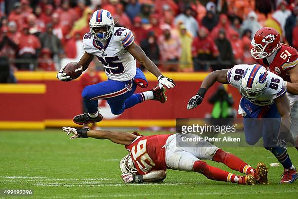 LeSean McCoy of the Buffalo Bills leaps over the outstretched arm of Derrick Johnson of the Kansas City Chiefs at Arrowhead Stadium during the third...
