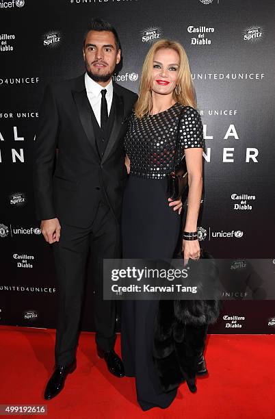 Sergio Romero and Eliana Guercio attend the United for UNICEF Gala Dinner at Old Trafford on November 29, 2015 in Manchester, England.