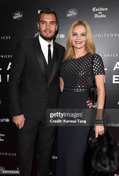 Sergio Romero and Eliana Guercio attend the United for UNICEF Gala Dinner at Old Trafford on November 29, 2015 in Manchester, England.