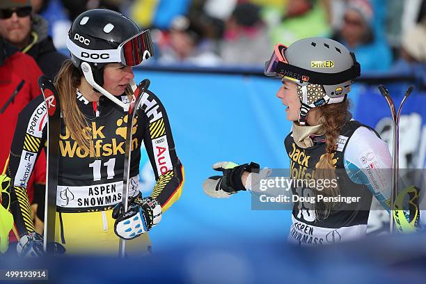 Marie-Michele Gagnon of Canada, 15th place, and Resi Stiegler of the United States, 10th place, talk after their second run in slalom during the Adui...