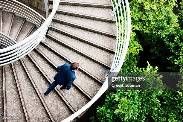 heading up - spiral staircase stock pictures, royalty-free photos & images
