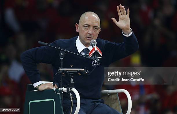 Umpire Pascal Maria of France gestures during the victory of Andy Murray over David Goffin of Belgium during day three of the Davis Cup Final 2015...