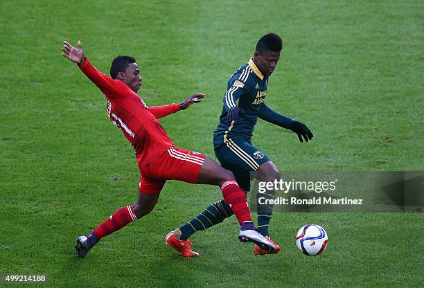 Dairon Asprilla of Portland Timbers dribbles the ball past Fabian Castillo of FC Dallas during the Western Conference Finals-Leg 2 of the MLS...