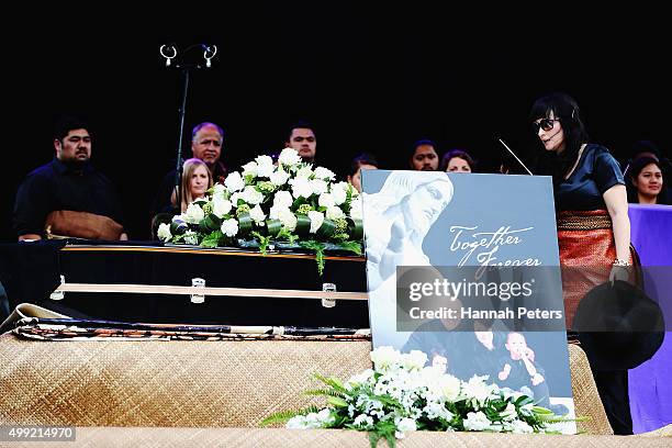 Widow of Jonah Lomu, Nadene Lomu kisses a photo of her late husband on stage at the Public Memorial for Jonah Lomu at Eden Park on November 30, 2015...