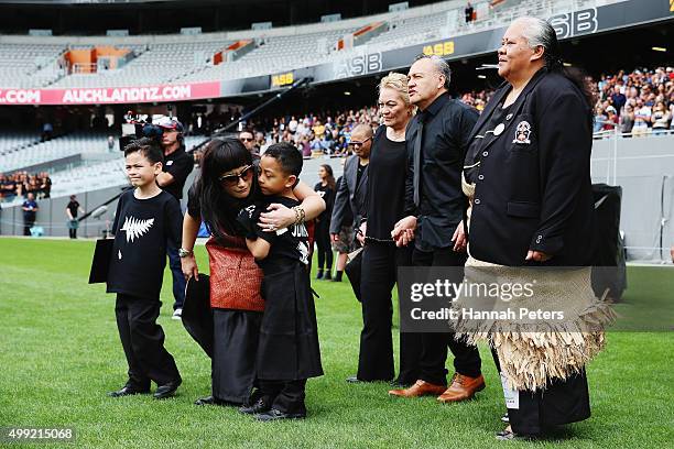 Widow of Jonah Lomu, Nadene Lomu walks onto Eden Park with her two sons Brayley Lomu and Dhyreille Lomu, her mother Lois, father Mervyn Kuiek and...