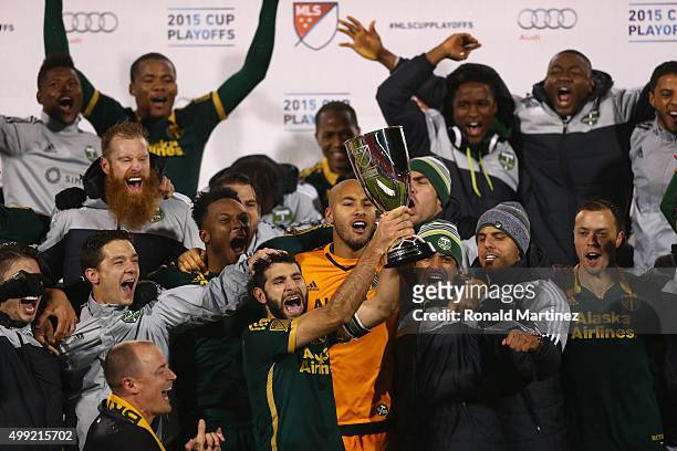 Diego Valeri of Portland Timbers raises the MLS Western Conference trophy after defeating FC Dallas in the Western Conference Finals-Leg 2 of the MLS...