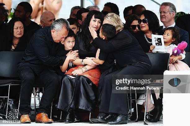 Widow of Jonah Lomu, Nadene Lomu is comforted by her two sons Brayley Lomu and Dhyreille Lomu, her mother Lois Kuiek and father Mervyn Kuiek during...