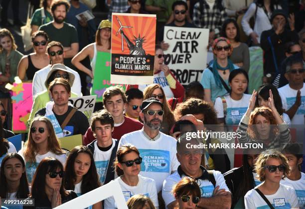 Environmental activists and supporters during a rally calling for action on climate change in Los Angeles, California on November 29 a day before the...