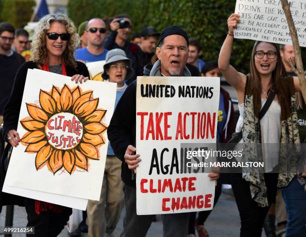 Actor and activist A. Martinez surrounded by Environmental activists and supporters during a rally calling for action on climate change in Los...