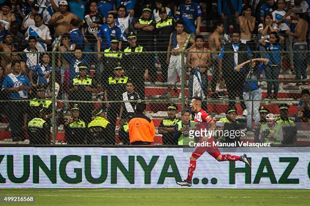 Fernando Uribe celebrates after scoring the opening goal during the quarterfinals second leg match between Toluca and Puebla as part of the Apertura...