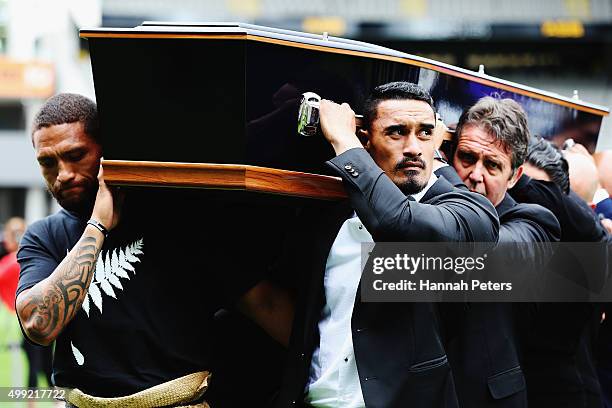 Rugby League player Manu Vatuvei and All Blacks player Jerome Kaino carry the casket carrying Jonah Lomu from the Public Memorial for Jonah Lomu at...