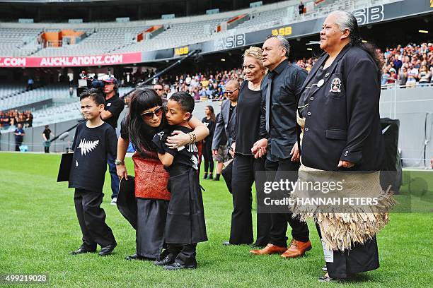 Nadene Lomu , widow of New Zealand All Blacks rugby legend Jonah Lomu, walks onto Eden Park with her two sons Brayley and Dhyreille , her parents...