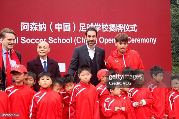Former footballer Robert Pires attends Arsenal Soccer School opening ceremony at Hongkou Stadium on November 29, 2015 in Shanghai, China.