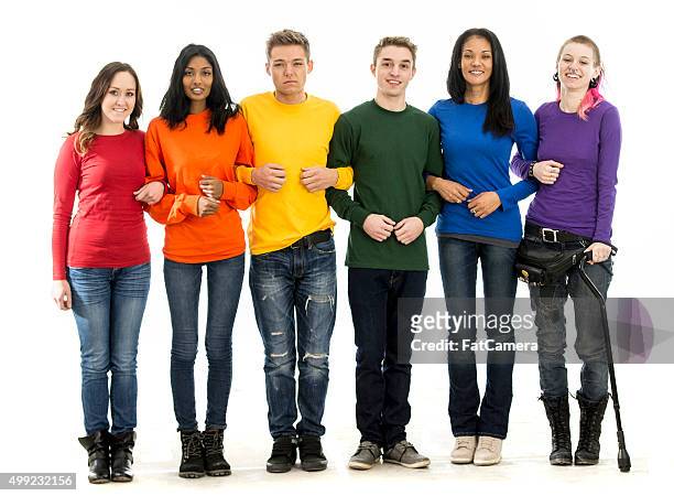 standing together for gay pride - arm in arm stock pictures, royalty-free photos & images