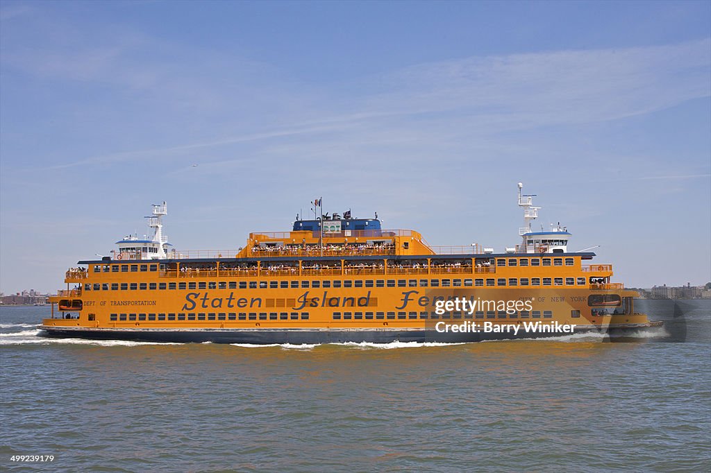 Orange ferry boat profile