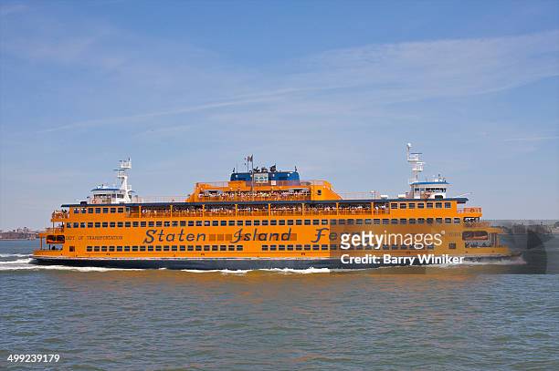orange ferry boat profile - staten island ferry - fotografias e filmes do acervo