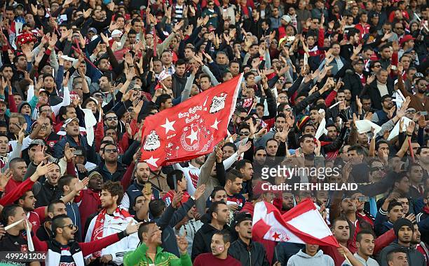 Etoile du Sahel fans cheer their team on during the second final of the 2015 CAF - Confederation of African Football Cup match between Tunisia's...