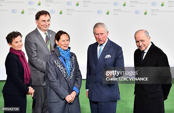 Britain's Prince Charles , flanked by French Foreign Affairs minister Laurent Fabius and French Minister for Ecology, Sustainable Development and...