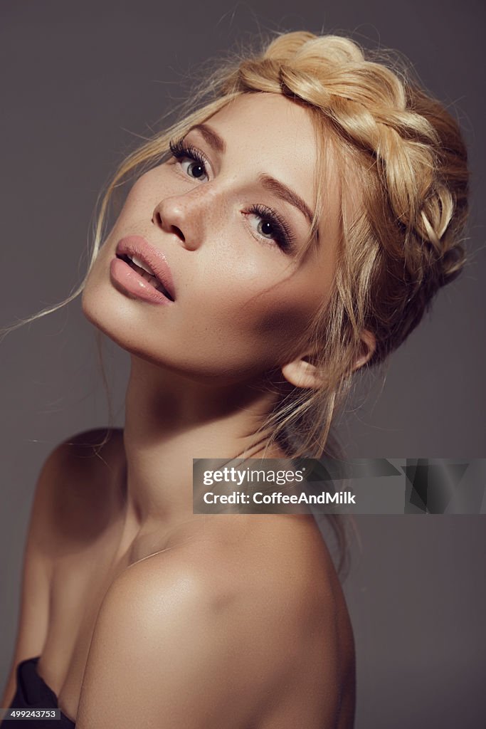 Studio shot of young beautiful woman