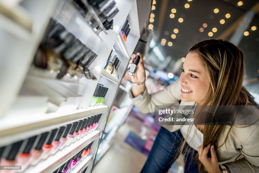 Woman buying cosmetics