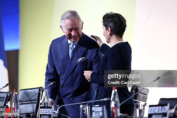 Christiana Figueres, the executive secretary of the UN Framework Convention on Climate Change congratulates Prince Charles after his keynote speech...