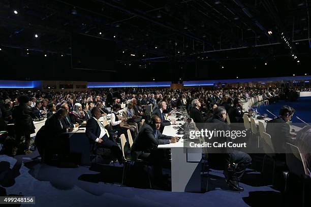 Delegates listen to a speech during the opening session of the United Nations Climate Summit on November 30, 2015 in Paris, France. Political leaders...