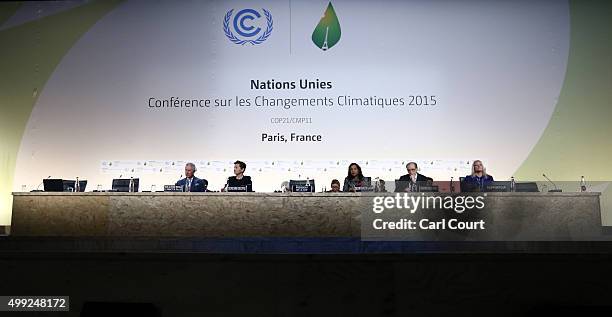 Delegates including Prince Charles listen to a speech during the opening session of the United Nations Climate Summit on November 30, 2015 in Paris,...