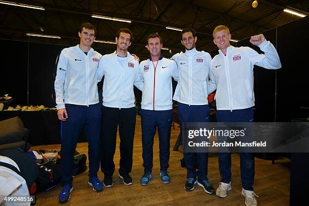 The victorious Great Britain team of Jamie Murray, Andy Murray, Captian Leon Smith, James Ward and Kyle Edmund pose for a photo following their...