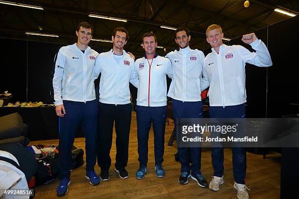 The victorious Great Britain team of Jamie Murray, Andy Murray, Captian Leon Smith, James Ward and Kyle Edmund pose for a photo following their...