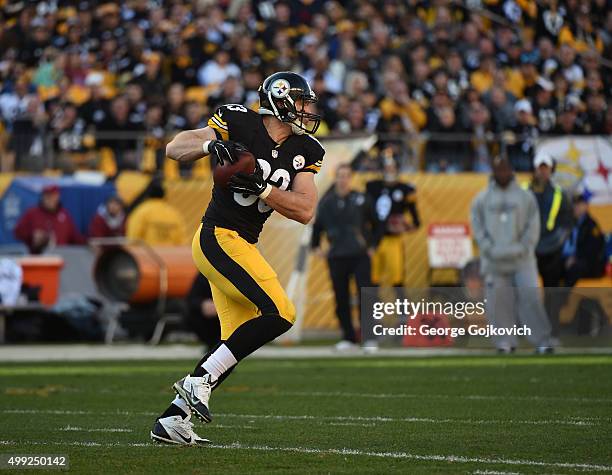 Tight end Heath Miller of the Pittsburgh Steelers runs with the football after catching a pass against the Cleveland Browns during a game at Heinz...