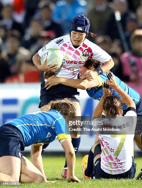 Mifuyu Koide of Japan is tackled during the World Sevens Asia Olympic Qualification match between Japan and Kazakhstan at Prince Chichibu Stadium on...