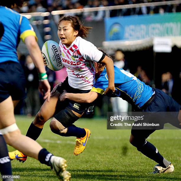 Marie Yamaguchi of Japan runs with the ball during the World Sevens Asia Olympic Qualification match between Japan and Kazakhstan at Prince Chichibu...