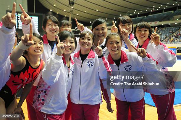 Koko Tsurumi and the Nippon Sport Science University Women's team celebrate winning during day two of the All Japan Artistic Gymnastics Team...