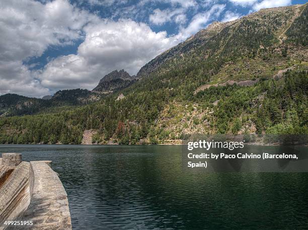 dam at sant maurici lake in spain - lerida stock pictures, royalty-free photos & images