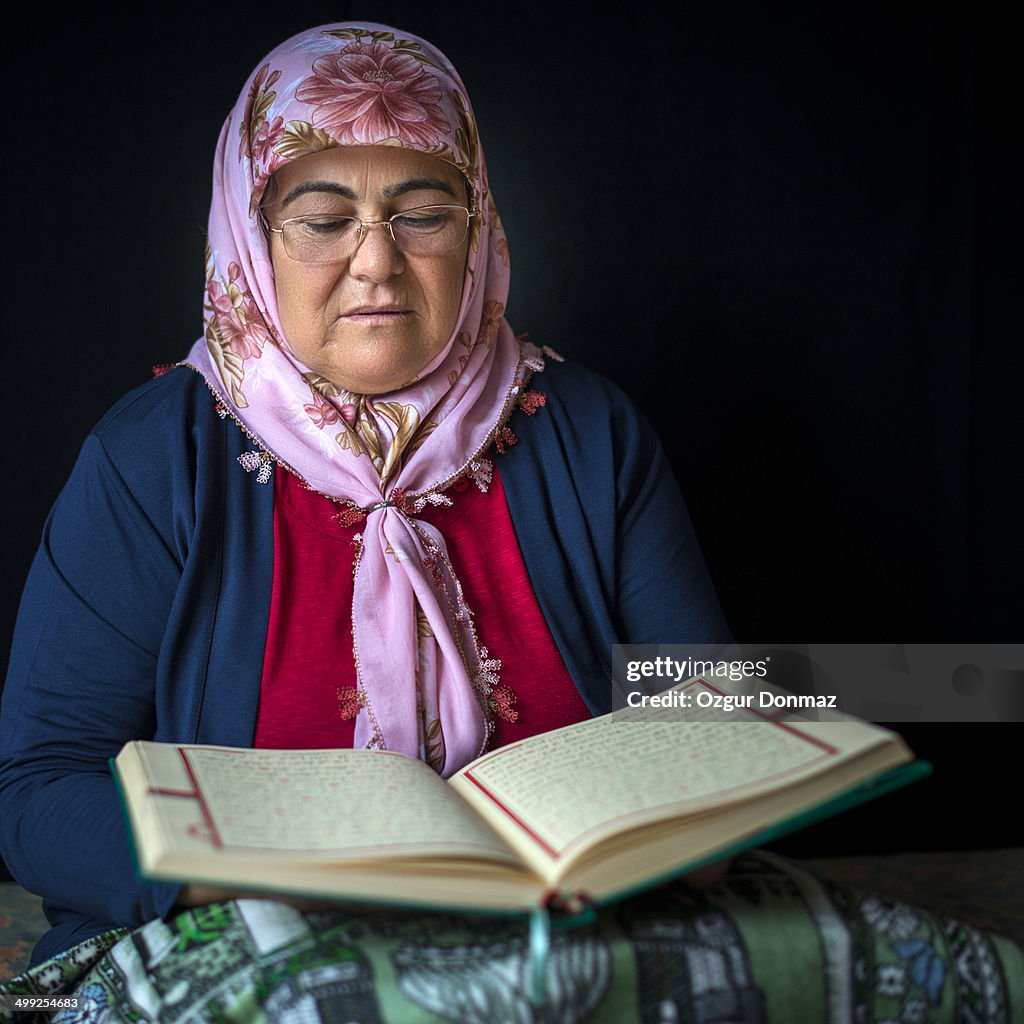 Muslim Woman Reading Quran