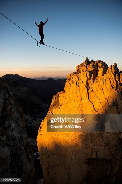 brave - slacklining stock pictures, royalty-free photos & images
