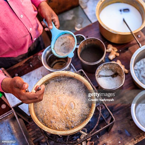 indian street seller selling tea - masala chai in jaipur - masala stock pictures, royalty-free photos & images