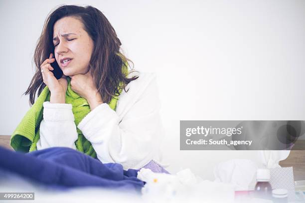 woman with sore throat - svullen bildbanksfoton och bilder