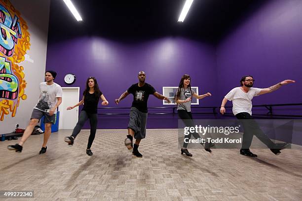 Cast members Danny Nielsen, Allison Toffan, Travis Knights, Stephanie Cadman and Ryan Foley rehears for the Big Band Tap Revue in Toronto, Ontario.