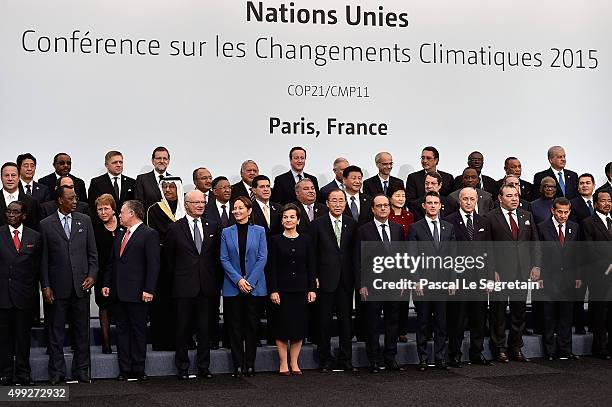 World leaders pose during the family photo session of the Cop 21 on November 30, 2015 in Paris, France. World leaders are meeting in Paris for the...