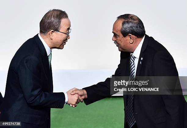 United Nations Secretary General Ban Ki-moon greets Micronesia President Peter Christian as he arrives for the opening of the UN conference on...