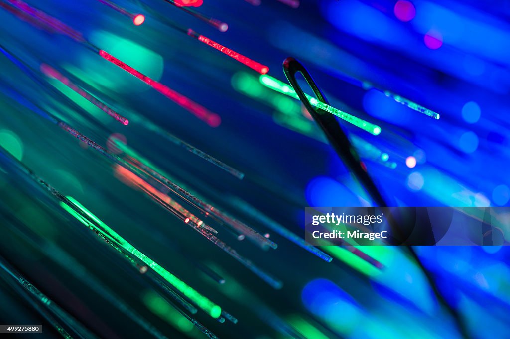 Fiber optic passing through eye of needle