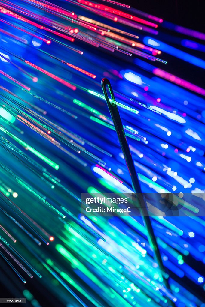 Fiber optic passing through eye of needle