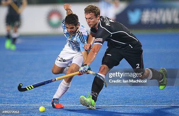 Matias Rey of Argentina vies with Mathias Muller of Germany during the match between Argentina and Germany on day four of The Hero Hockey League...